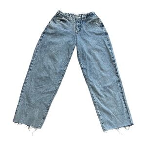 Good American light wash barrel jeans